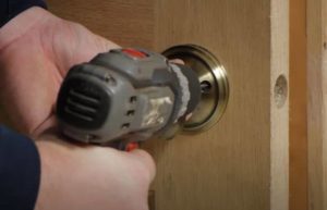 screwing dummy door knob